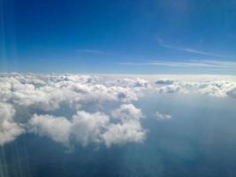 Blue sky with clouds background photo