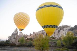 beautiful scenery flight of balloons in the mountains of Cappadocia photo