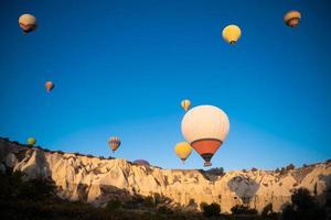 beautiful scenery flight of balloons in the mountains of Cappadocia photo