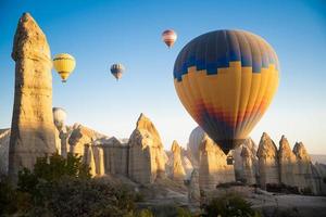 beautiful scenery flight of balloons in the mountains of Cappadocia in love valley photo