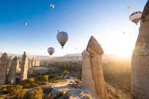 beautiful scenery flight of balloons in the mountains of Cappadocia in love valley photo