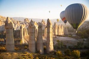 beautiful scenery flight of balloons in the mountains of Cappadocia in love valley photo