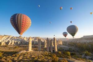 beautiful scenery flight of balloons in the mountains of Cappadocia in love valley photo