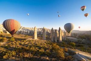 beautiful scenery flight of balloons in the mountains of Cappadocia in love valley photo