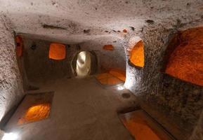 interior of an underground ancient city in Turkey in the Cappadocia region. photo