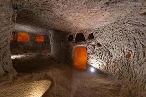 interior of an underground ancient city in Turkey in the Cappadocia region. photo