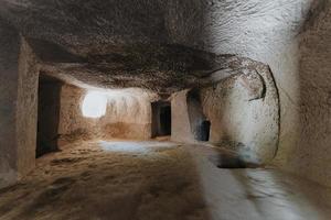 A cave church in Cappadocia with inscriptions on the walls, frescoes from the beginning of Christianity. photo