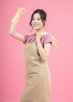 Young Asian woman housewife on background photo