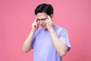 Young Asian man sick, illness on background photo