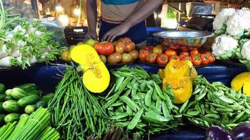 Colorful variety of fruits and vegetables at fresh produce market video