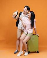 young Asian couple travel concept background photo