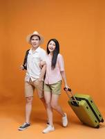 young Asian couple travel concept background photo