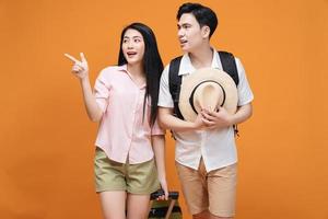 young Asian couple travel concept background photo