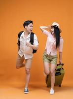 young Asian couple travel concept background photo