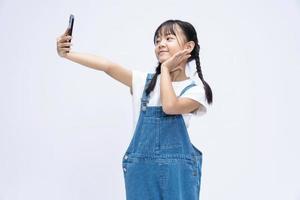 Portrait of Asian child on background photo