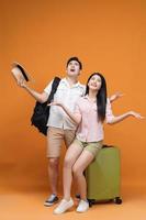 young Asian couple travel concept background photo