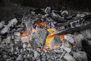 Burning coal in a forge photo