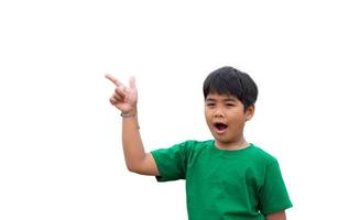 The boy smiled and pointed his hand to his side. on a white background photo