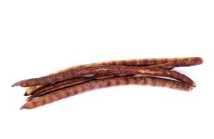 Dried red bean pods  on white background. Concept, Agriculture crop. Dried for preparing to select for next time seedling or for cooking. Thai native breed of beans. photo