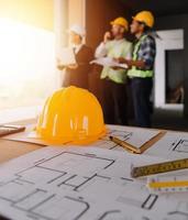 Architect concept, Architects working with blueprints in the office, Vintage Effect photo
