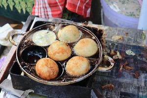 Fried eggs are usually called SD snacks in Indonesia which have been shaped and cooked ready to be put in a container and given toppings photo