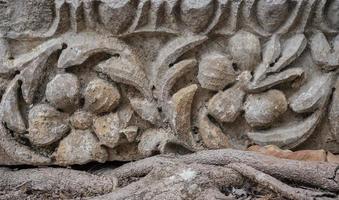 Details of carved stones on the top of the portico, beautiful stone carvings, history and heritage of ancient civilizations, details of a temple in the Aegean region of Turkey photo