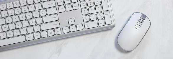 White wireless keyboard and mouse on table, pc equipment photo