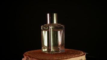 Perfume on wood Transparent perfume bottle video