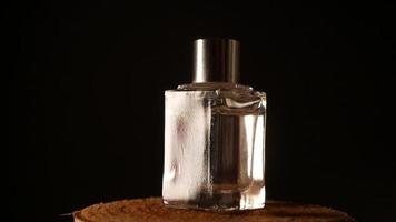 Perfume on wood Transparent perfume bottle video