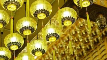 Select focus the yellow Chinese lantern decorated at 9 emperor temple video