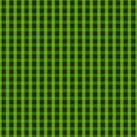 St. Patricks day tartan plaid. Scottish pattern in green and black cage. Scottish cage. Traditional Scottish checkered background. Seamless fabric texture. Vector seamless pattern