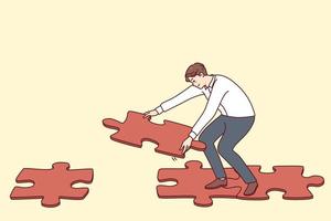 Man connecting jigsaw puzzle pieces making way or road to walk. Male find solution solving problem answering question. Flat vector illustration.