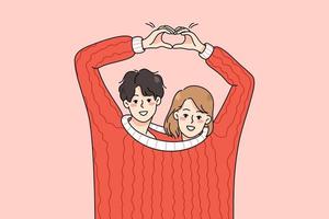 Cute happy couple lovers wearing one sweater make heart hand gesture. Smiling man and woman hug demonstrate love sign. Romance and relationship concept. Vector illustration.