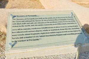 Persepolis, Iran - 8th june, 2022 - treasury of persepolis information board sign with information photo