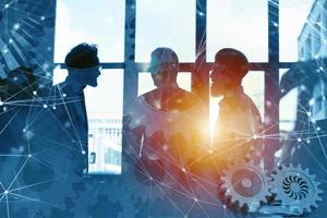 Business team with gears system. Teamwork, partnership and integration concept with network effect. double exposure photo