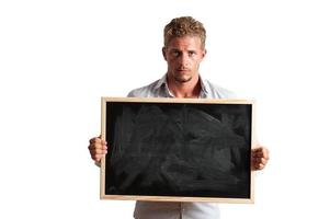 Young boy with blackboard photo