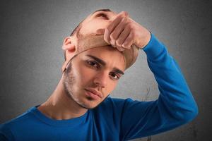 Teenager with adult mask photo