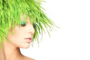 Nature beauty woman with fresh grass hair photo