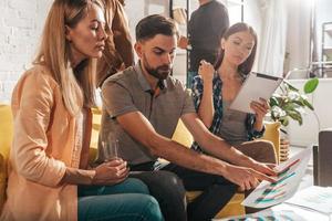 People work together in a modern office as teamwork and partner photo