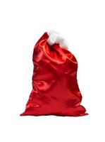 Santa claus sack full of christmas gifts ready to deliver photo