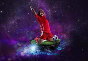 Football player into space wins the soccer match photo