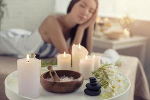 Woman relaxing with a massage in a spa center photo