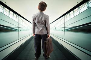Child on escalator photo