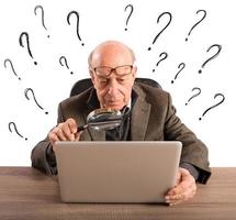 Difficult technology for a man elderly photo