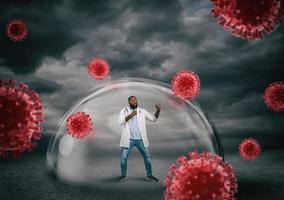 Doctor safely inside a shield dome that protects him from virus. Protection and safety concept photo