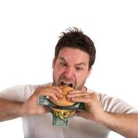 Greedy and fat businessman photo