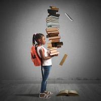 Pile of books for a little girl photo