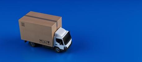 Big cardboard box package on a white truck ready to be delivered photo