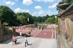 New York City, USA - August 8, 2019-people strolling in central park during a sunny day photo