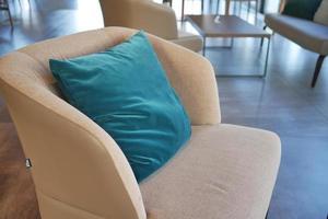 Close up of a fabric sofa with styled cushions photo